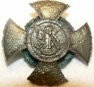 Powiększ zdjęcie Odznaka pułkowa 9 Pułku Strzelców Konnych z ekshumacji w okolicach Domanowa
